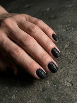 Cracked black nails