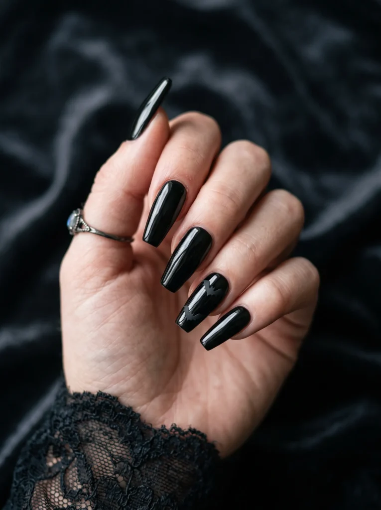 Bat silhouette accent nails