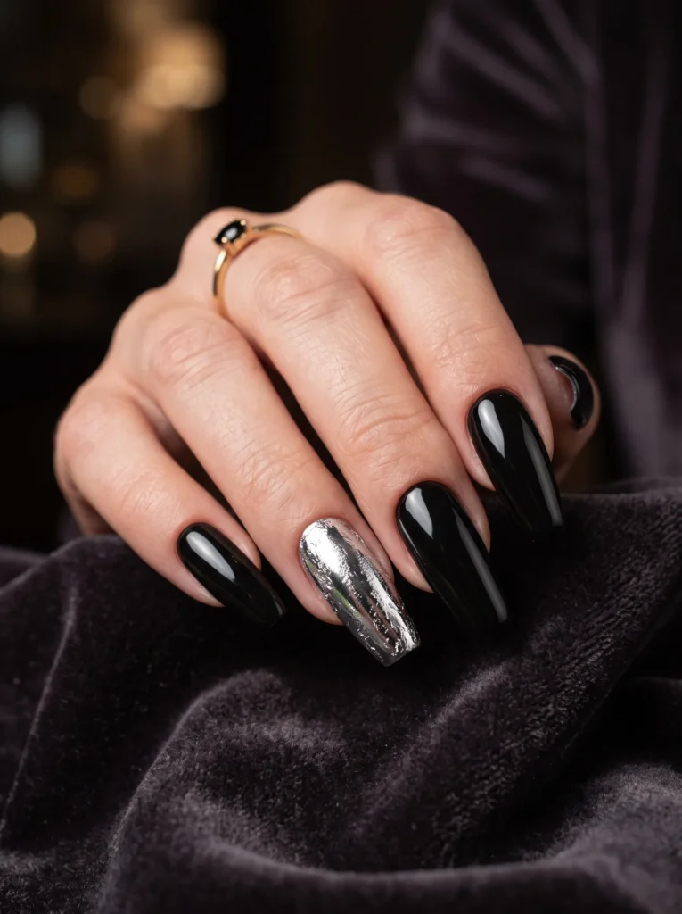 Glossy black with a single silver accent nail